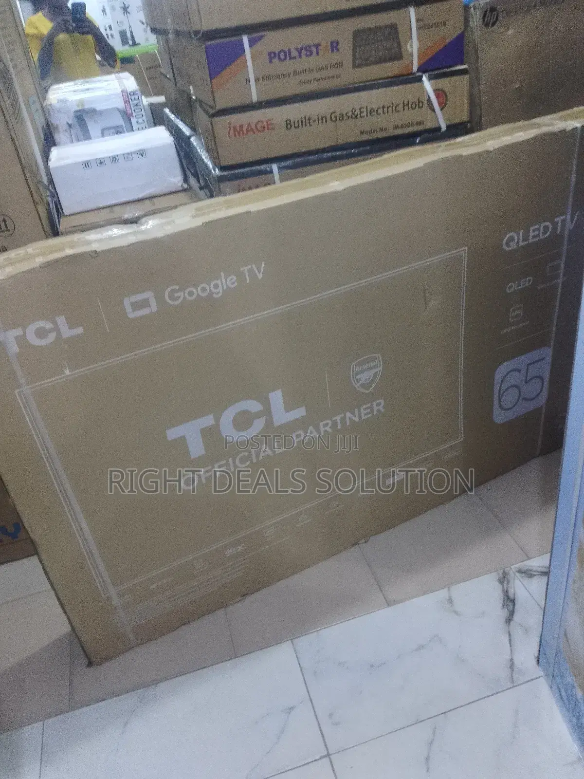 Experience Cinematic Brilliance: TCL 65" Qled Smart Tv