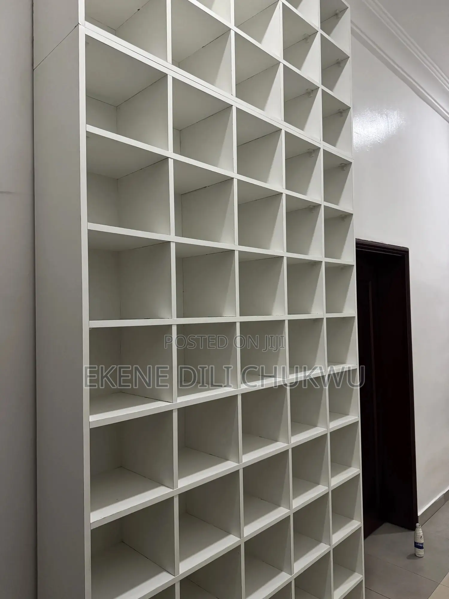Custom Floor-to-Ceiling Shoe Rack With Multiple Compartments
