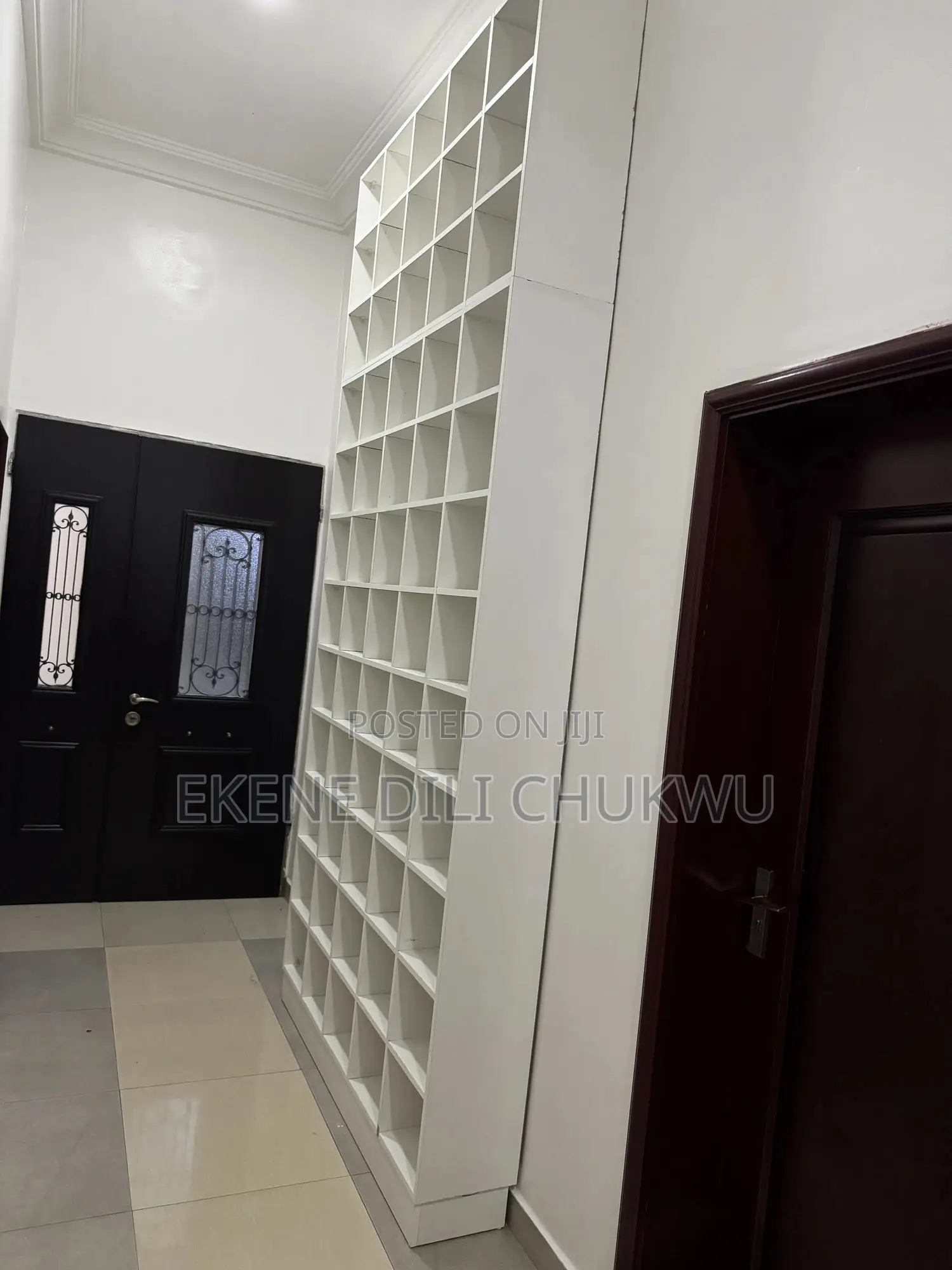Custom Floor-to-Ceiling Shoe Rack With Multiple Compartments