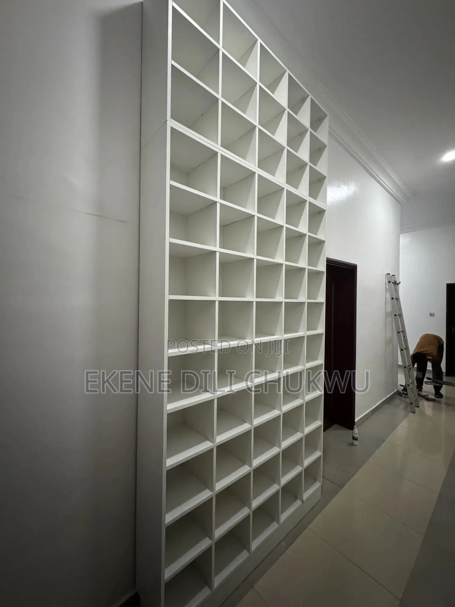 Custom Floor-to-Ceiling Shoe Rack With Multiple Compartments