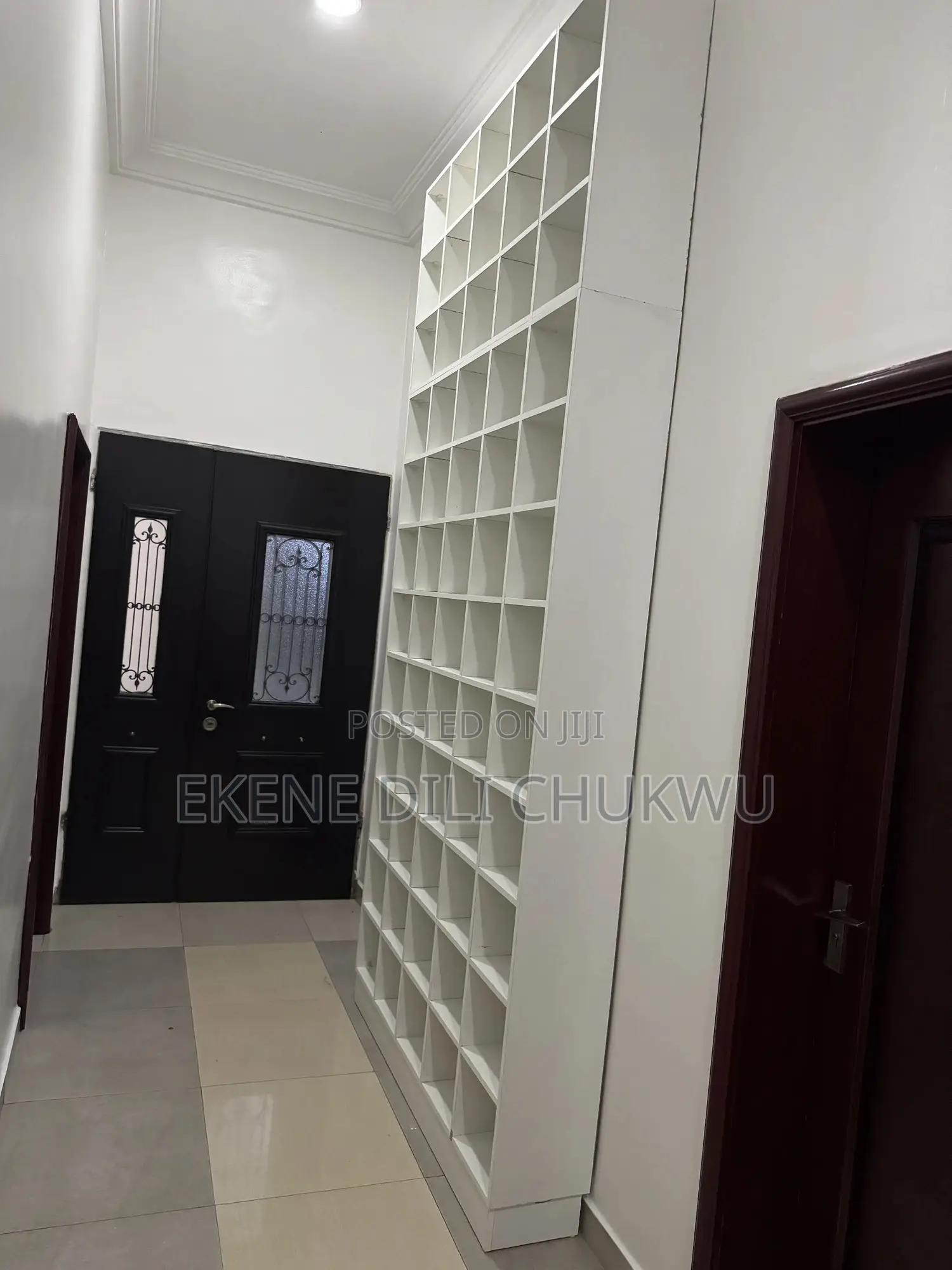 Custom Floor-to-Ceiling Shoe Rack With Multiple Compartments