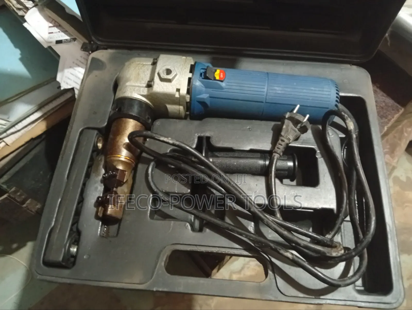 Electric Metal Nibbler, Which Is a Power Tool Cutting Sheet Metal.