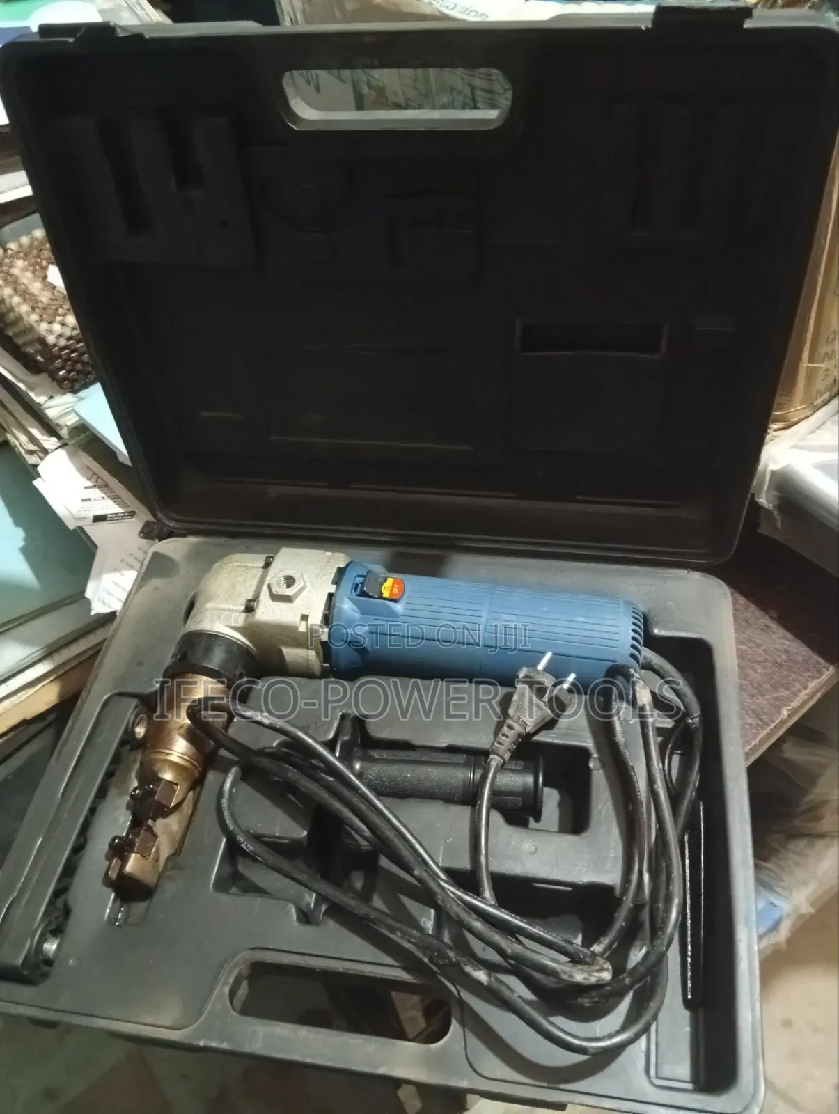 Electric Metal Nibbler, Which Is a Power Tool Cutting Sheet Metal.