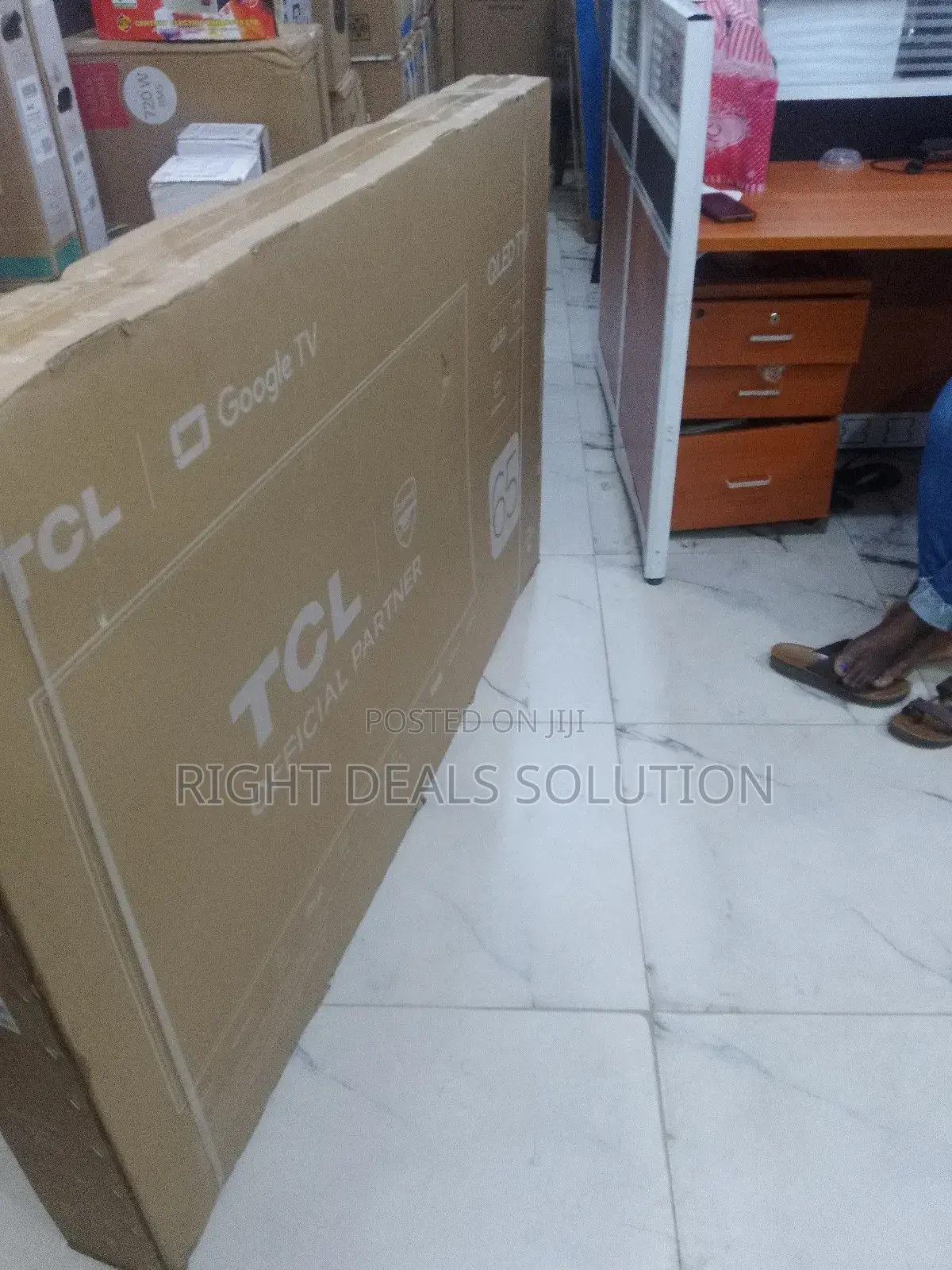 Cinema-Grade 65" TCL Qled: Quantum Dots, 144hz Action, Immersive Sound