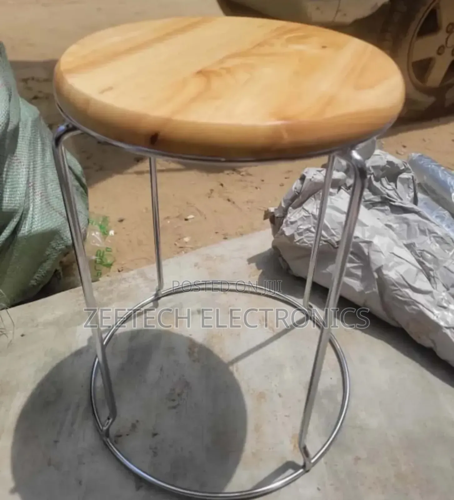Ound Wooden Top Metal Frame Stool.