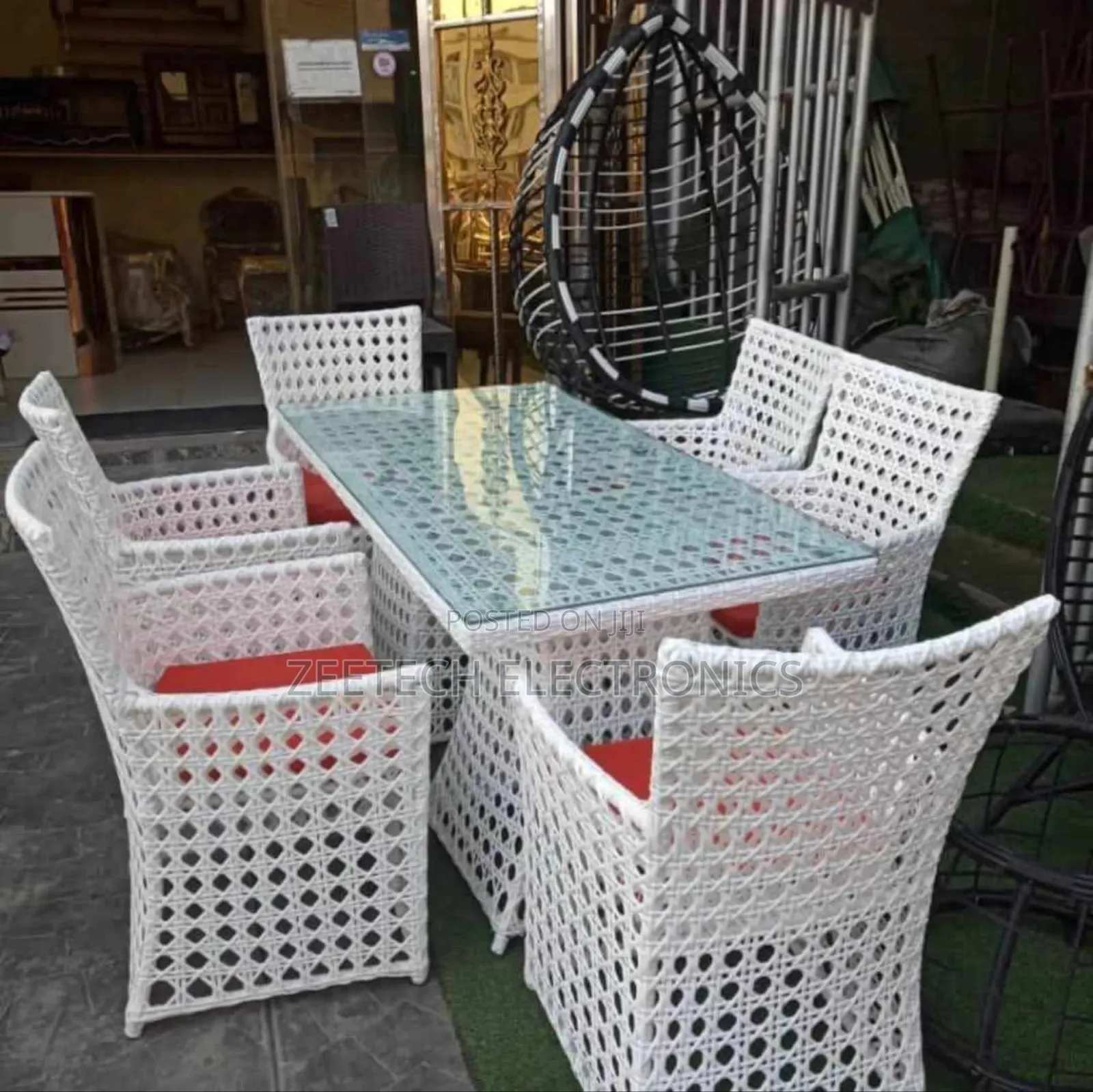 White Synthetic Rattan Outdoor Dining Set With a Glass-Top Table