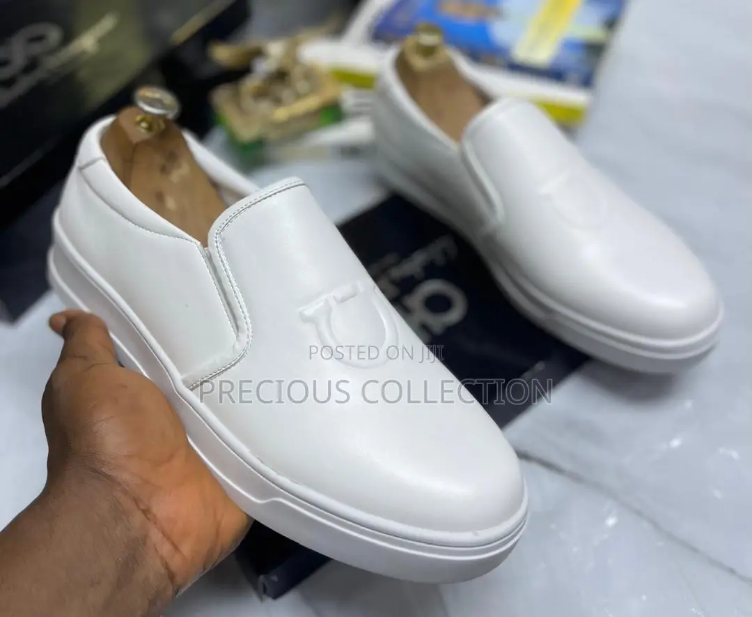 All White and Black Single Sole Pull on Ferragamo Shoe