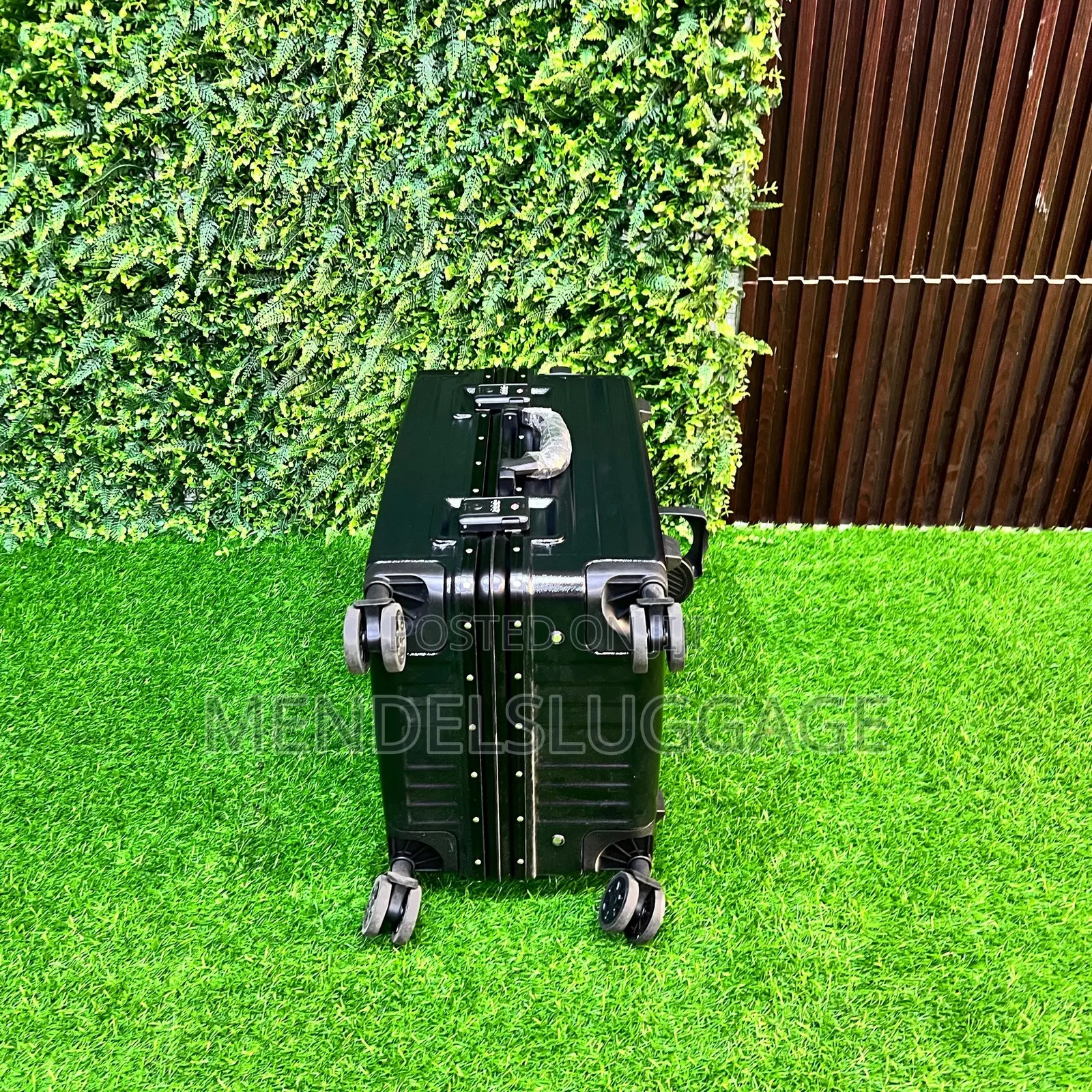Black Hard Case Luggage With Wheel System and Bottle Holder