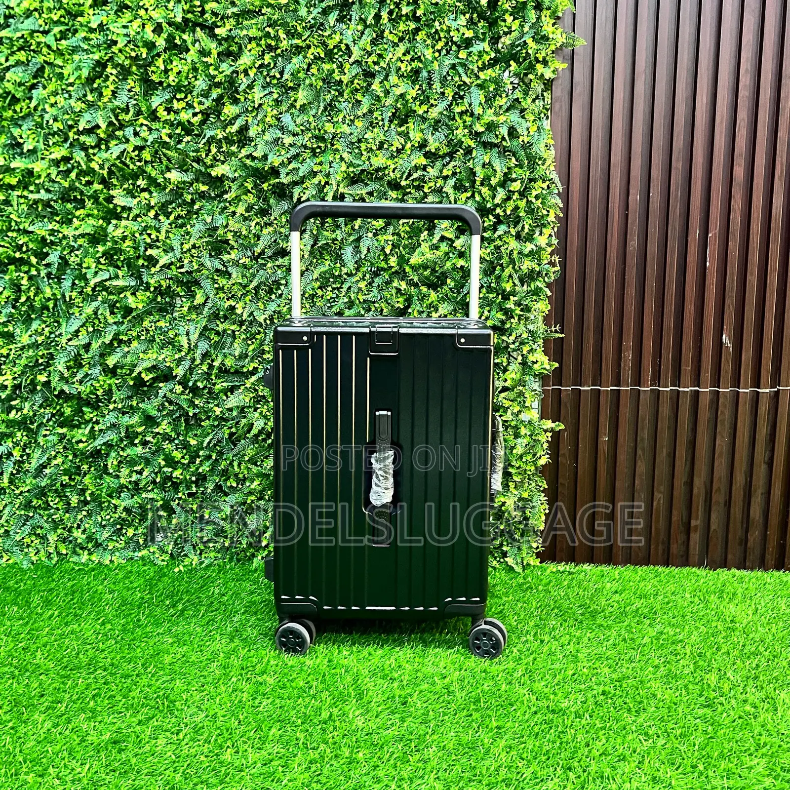 Black Hard Case Luggage With Wheel System and Bottle Holder