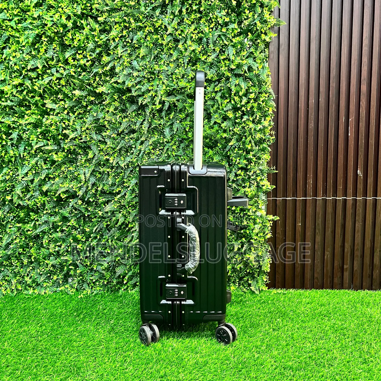 Black Hard Case Luggage With Wheel System and Bottle Holder