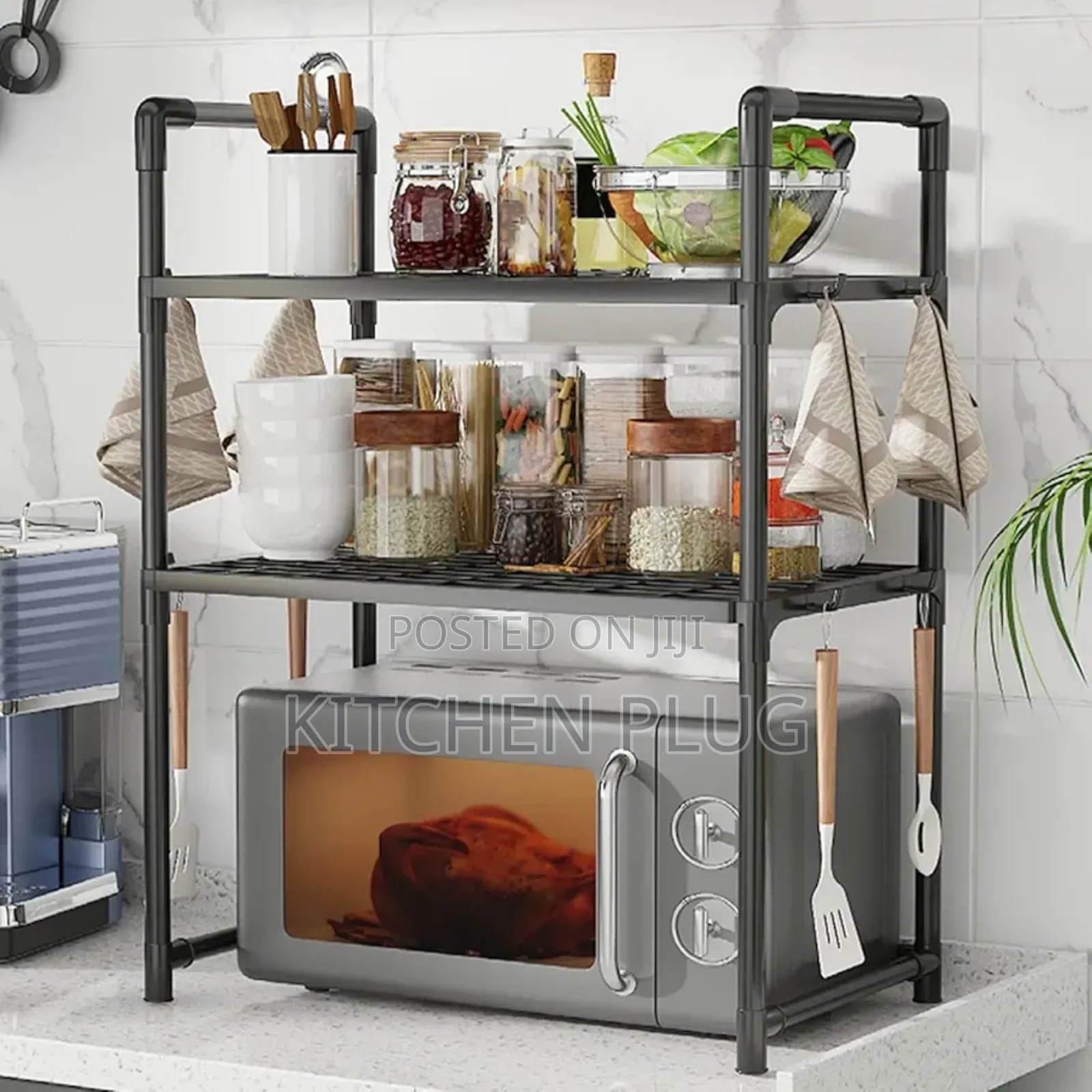 Black Metal Three-tier Microwave Oven Storage Rack.
