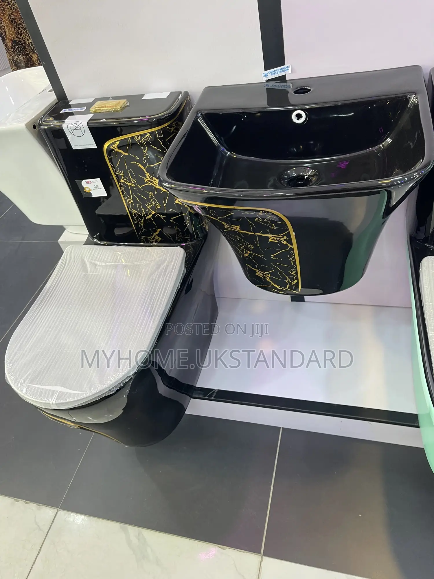 Black And Gold Water Closets With Hanging Basin