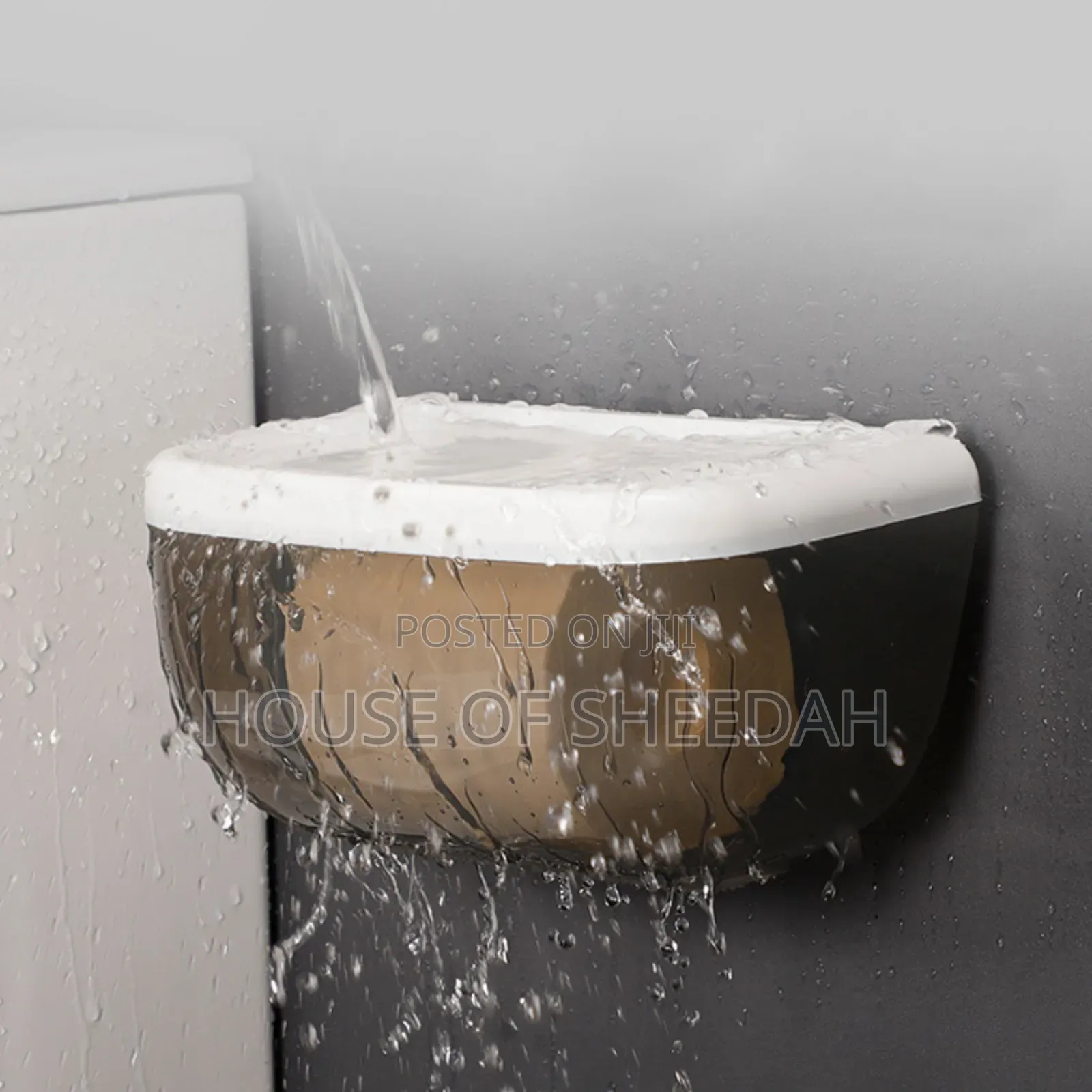 Wall Mounted Toilet Paper Dispenser With a Storage Shelf.