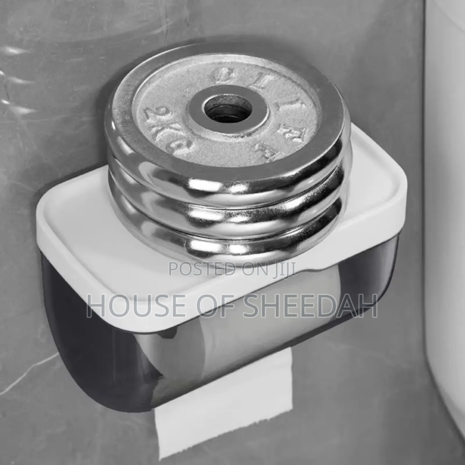 Wall Mounted Toilet Paper Dispenser With a Storage Shelf.
