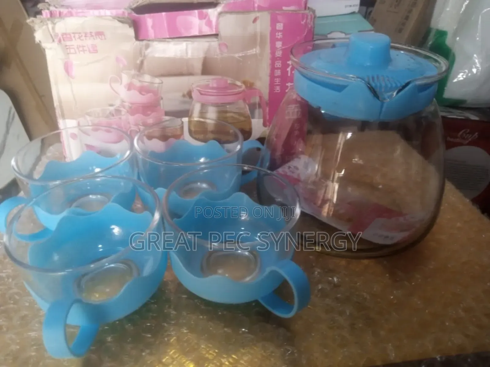 Tea Pot and 4 Glass Cups