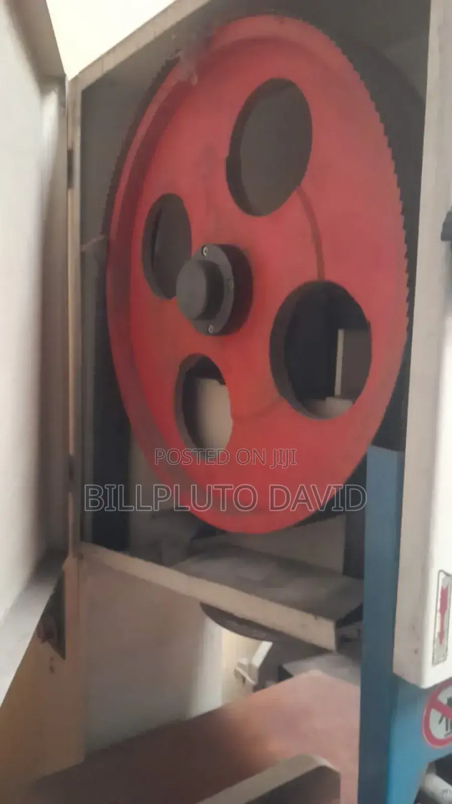 Industrial Vertical Band Saw Machine Used for Woodworking.