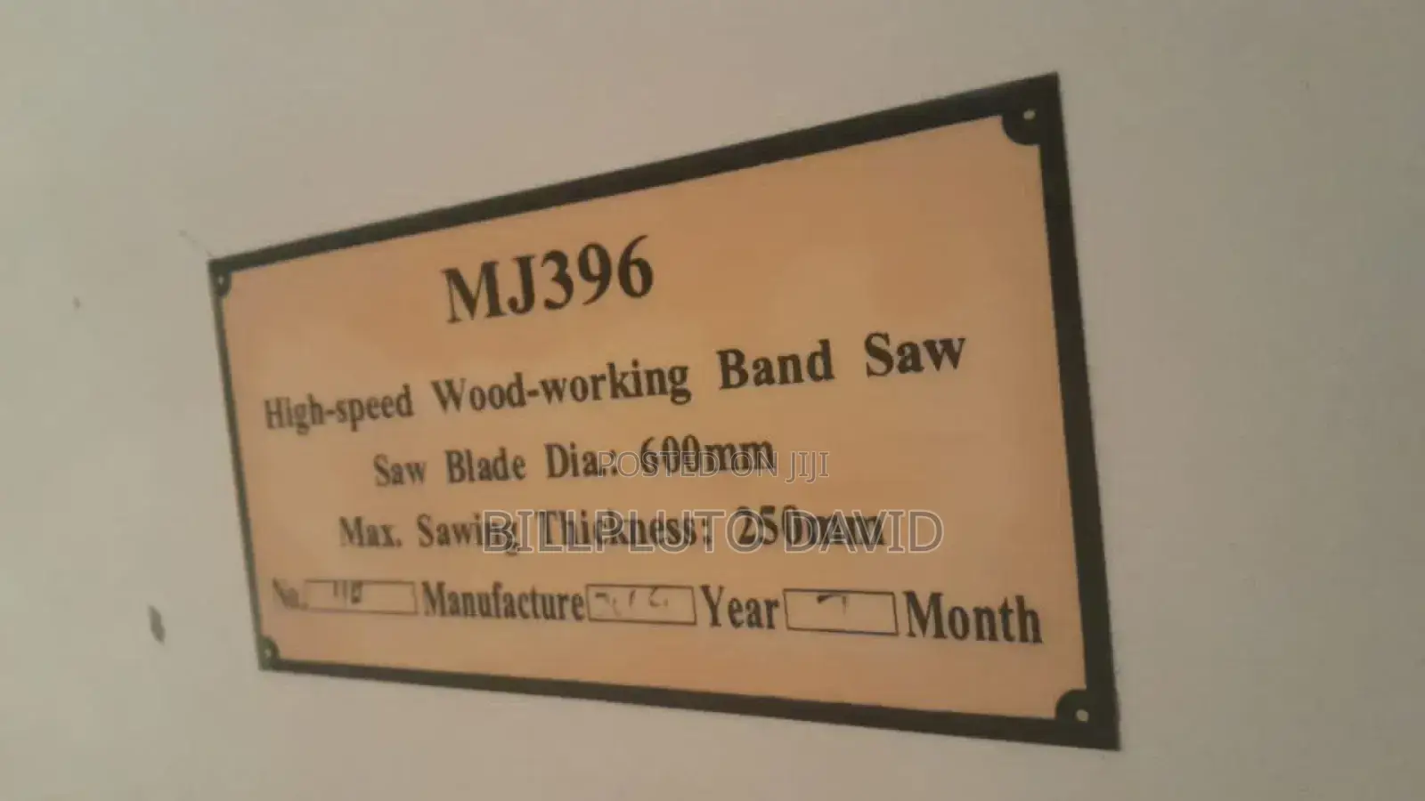 Industrial Vertical Band Saw Machine Used for Woodworking.