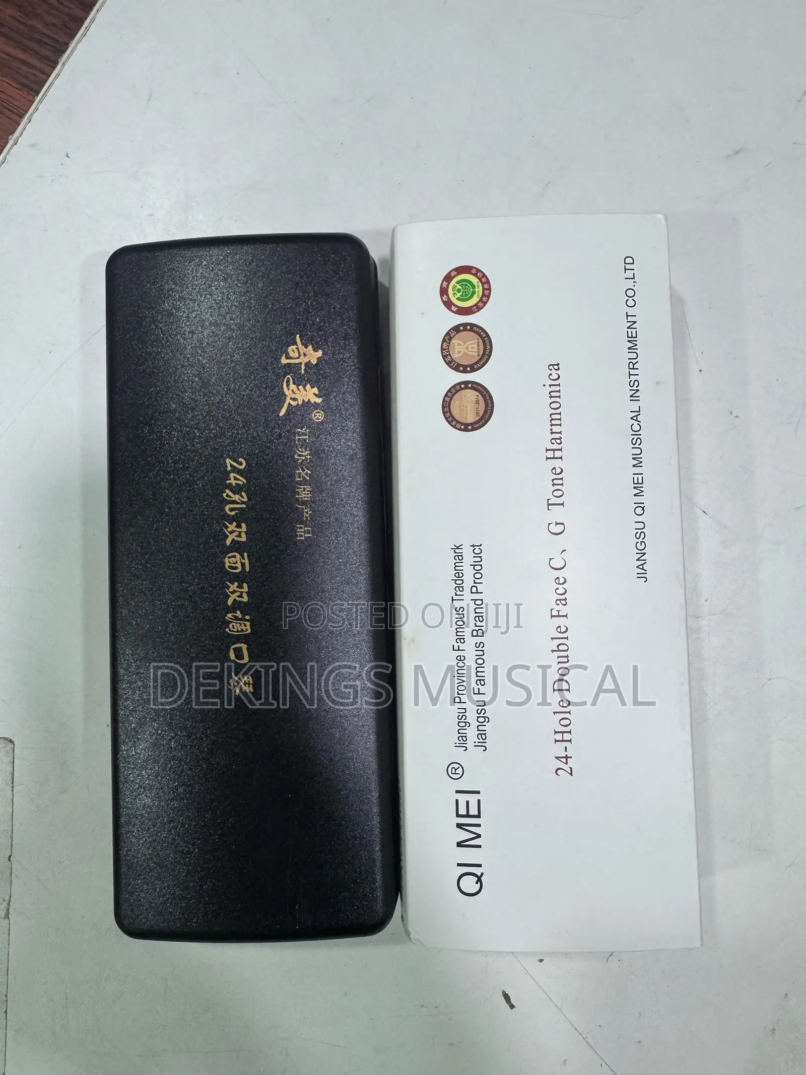 Qi Mei 24-Hole Double Face Harmonica in C and G Tones.
