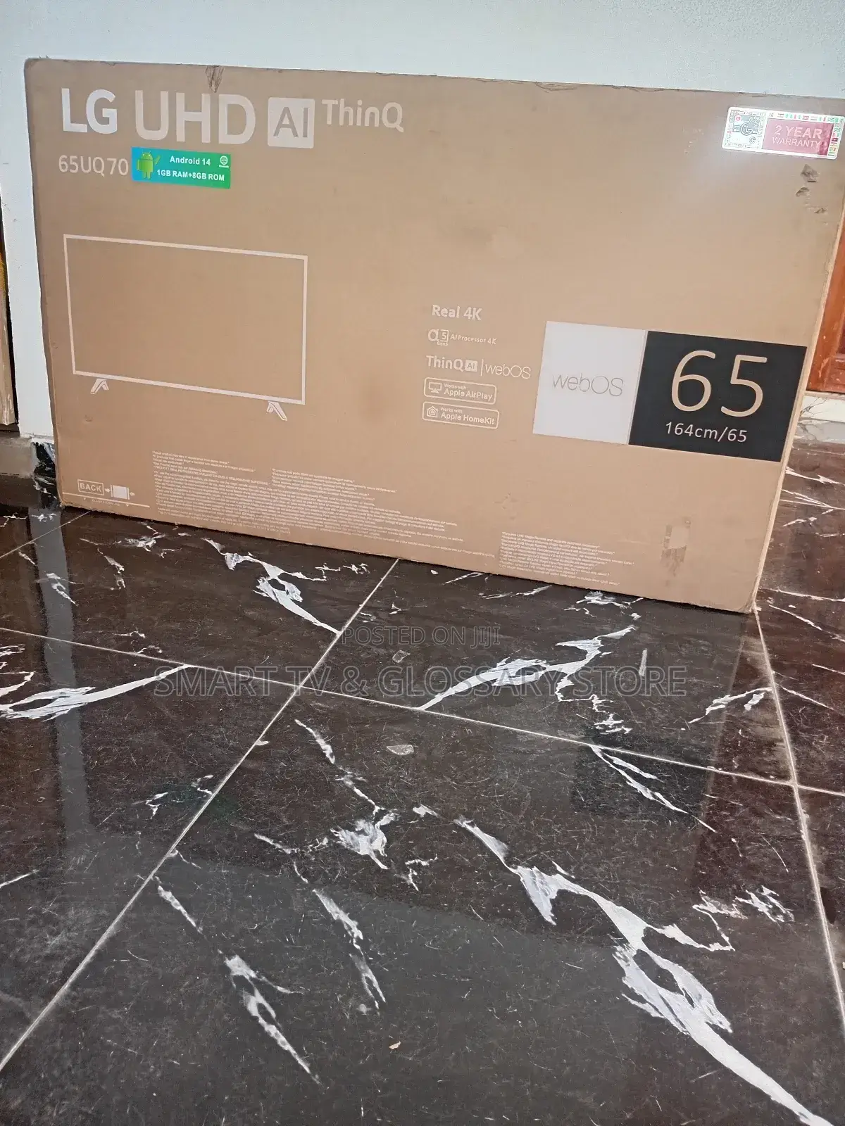 Lg 50 Inches  With Building  Showingcasing Apps