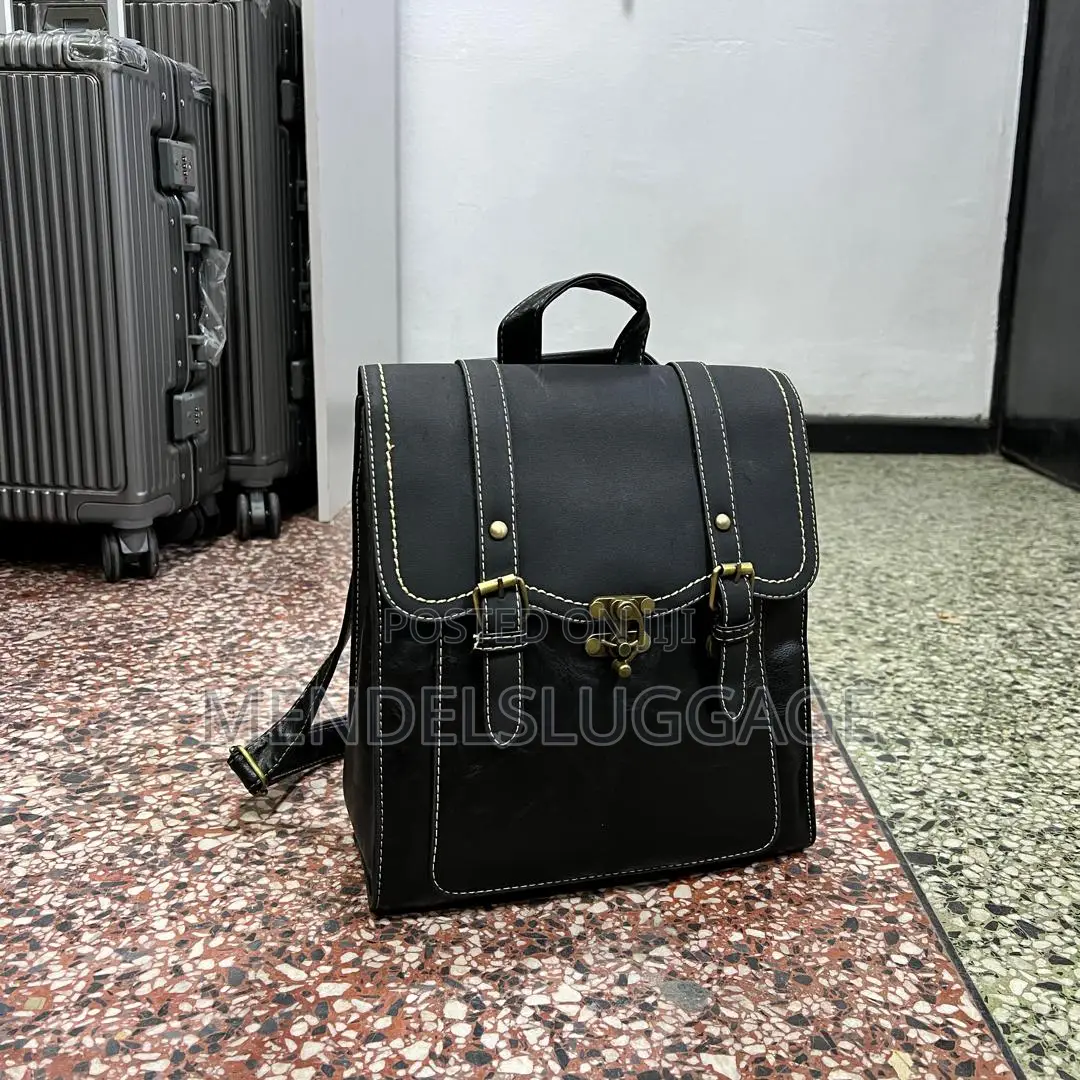 Black Leather Backpack With Buckle Straps