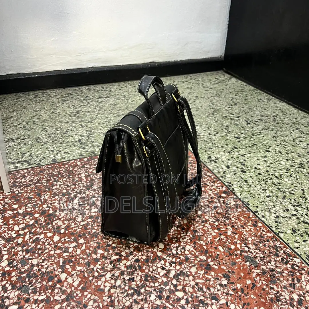 Black Leather Backpack With Buckle Straps