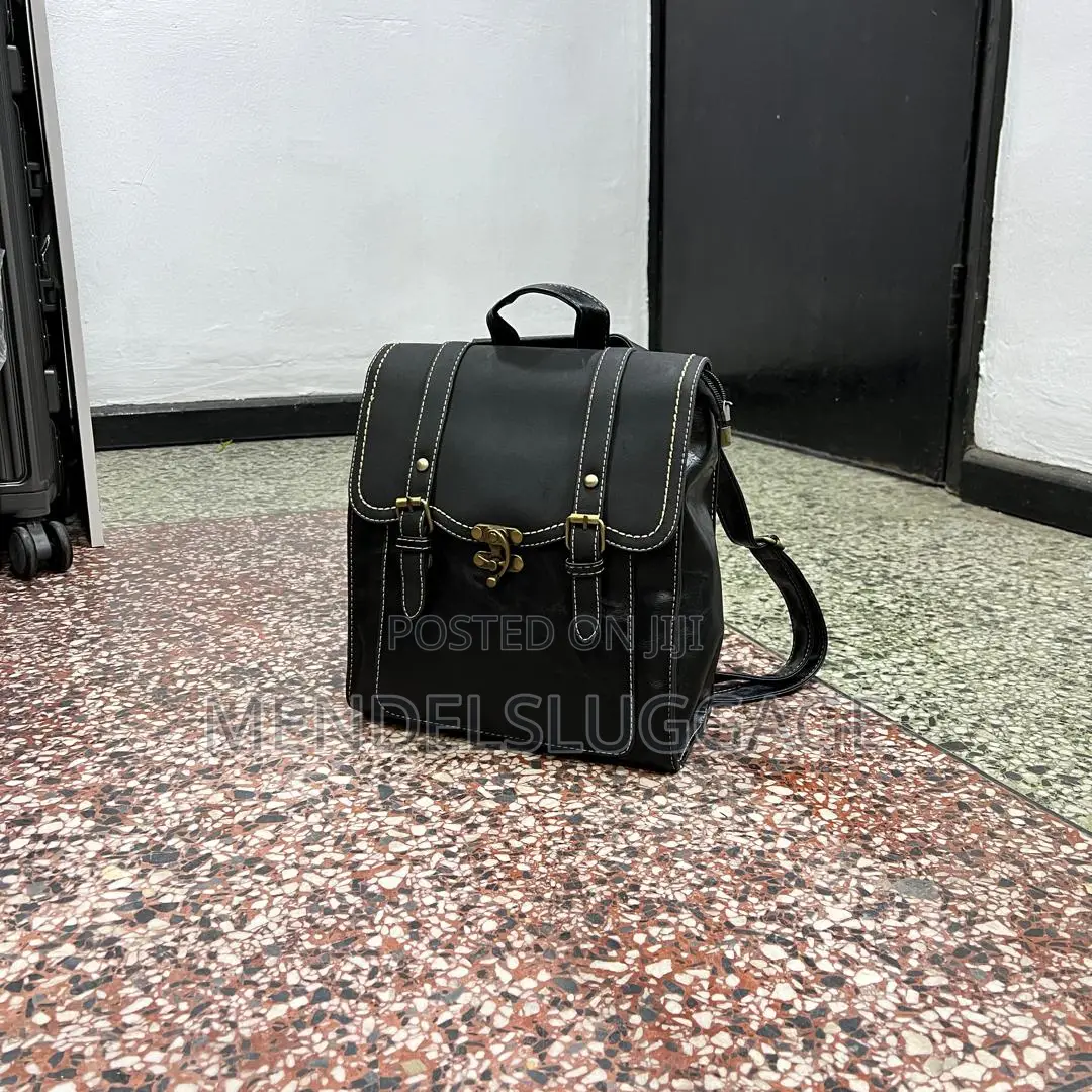 Classic Black Leather Backpack With Brass Clasp