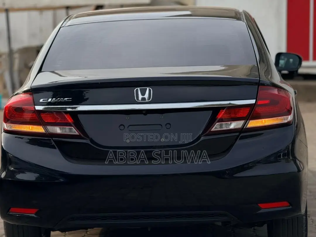 Honda Civic EX-L w/Navigation 2dr Coupe (1.8L 4cyl CVT) 2015 Black