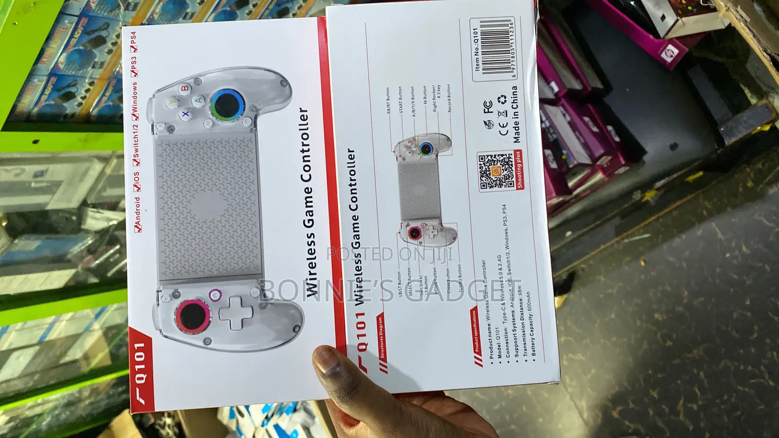 Q101 Telescopic Wireless Game Controller Designed for Mobile Devices.
