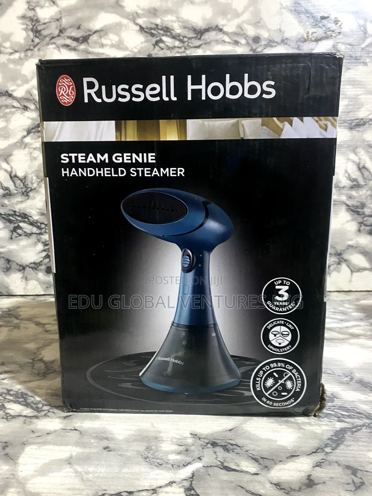Russell Hobbs Steam Genie Handheld Garment Steamer.