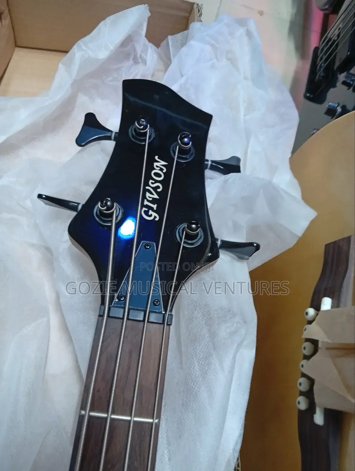 Givson Four String Active Bass Guitar With Bag and Strap.