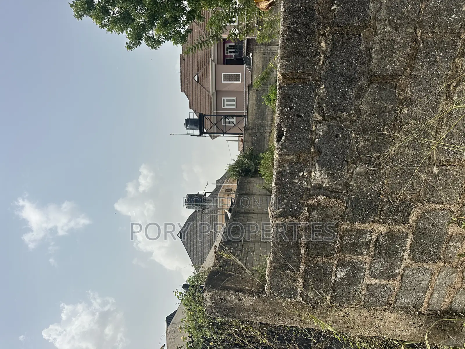 Bare Fenced Land for Sale