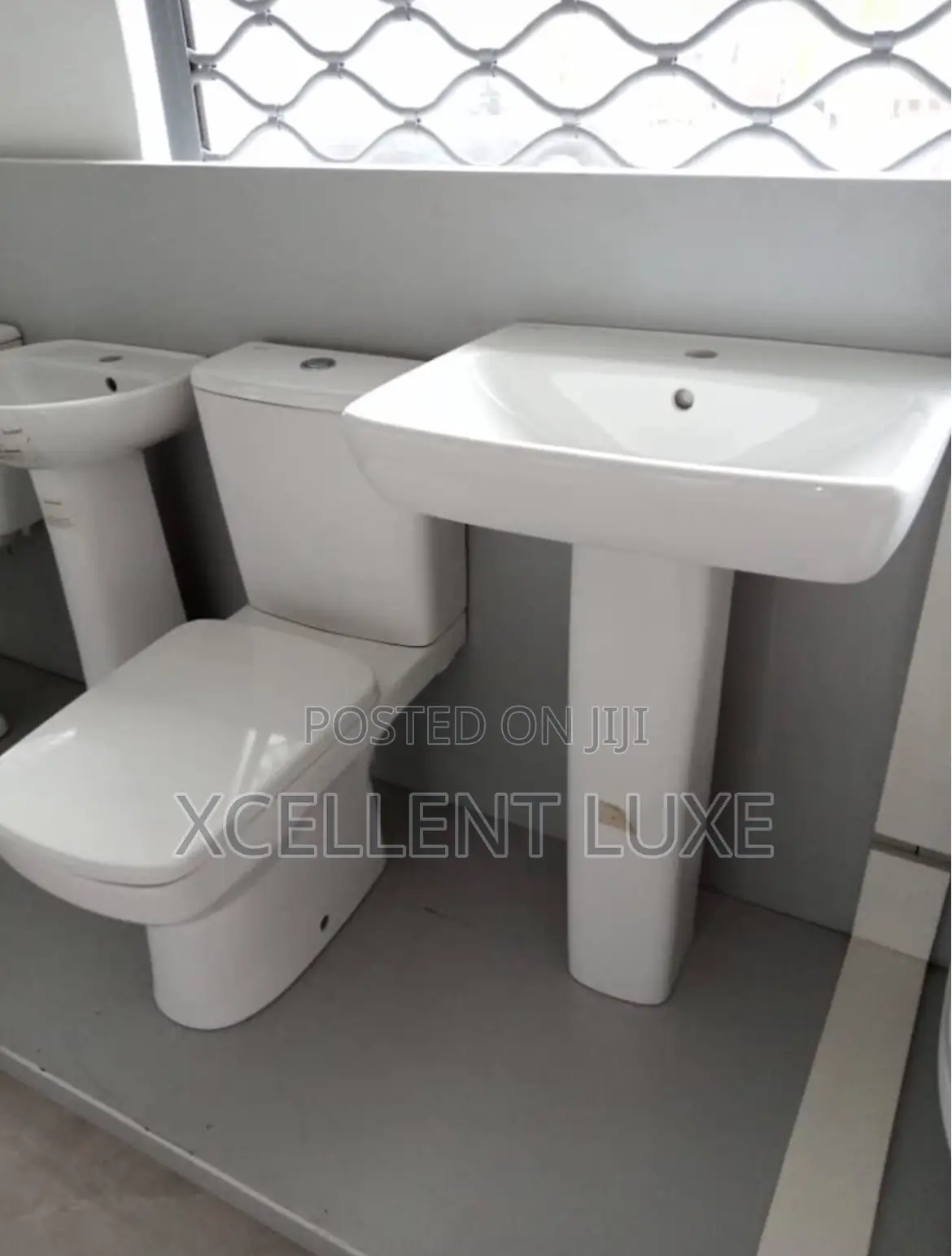 Geberit Water Closet With Standing Wash Hand Basin Rimless