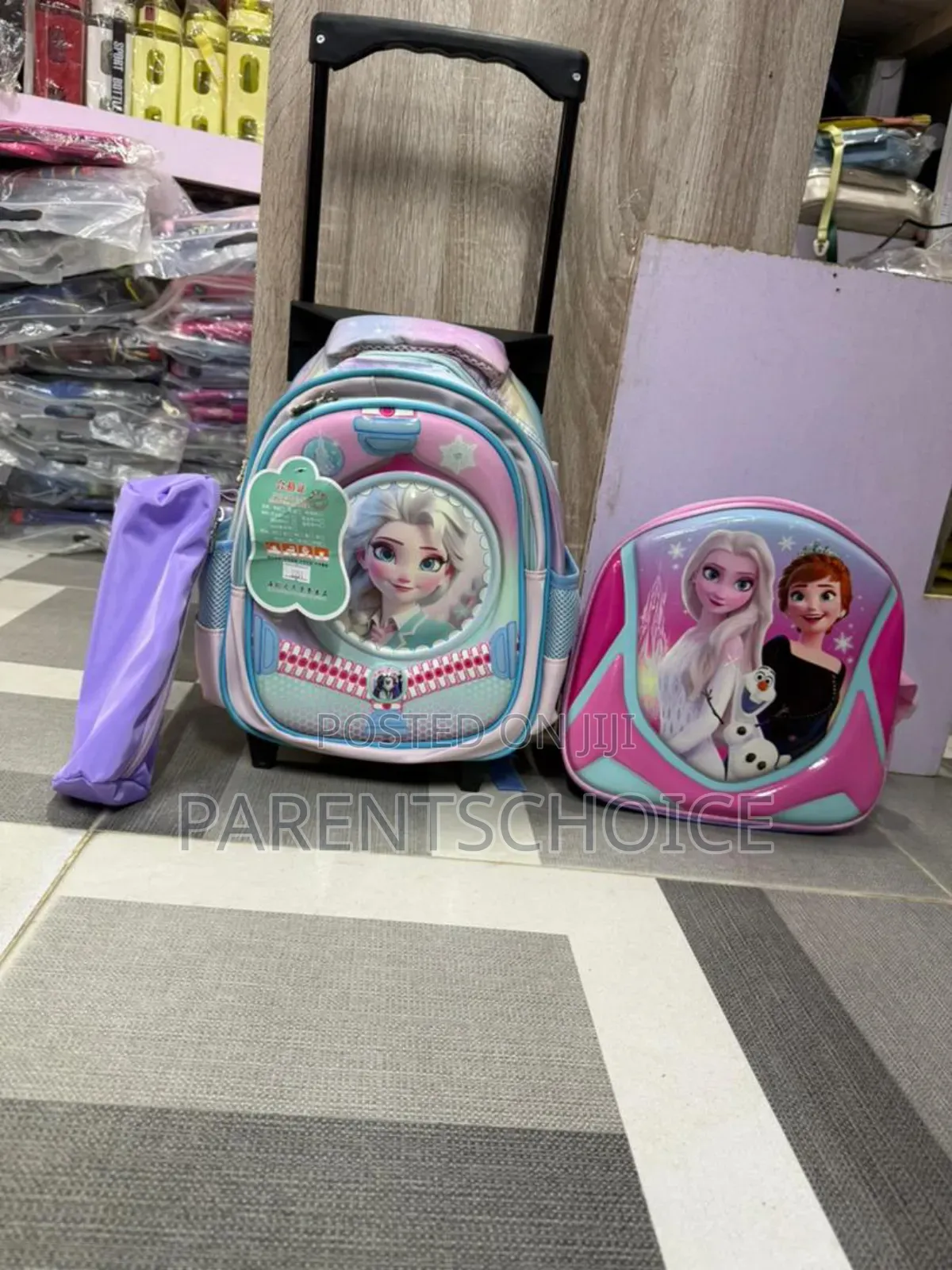 3d Pink School Backpack With Wheels and Embossed Design
