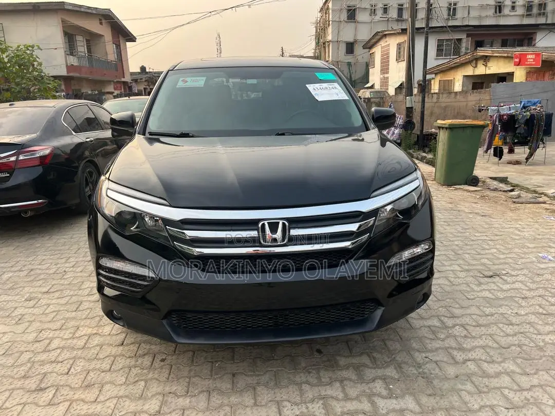 Honda Pilot Touring 4dr SUV 4WD (3.5L 6cyl 9A) 2017 Black