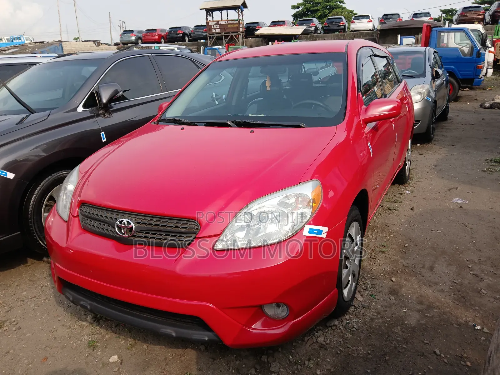 Toyota Matrix Hatchback AWD (1.8L 4cyl 4A) 2006 Red
