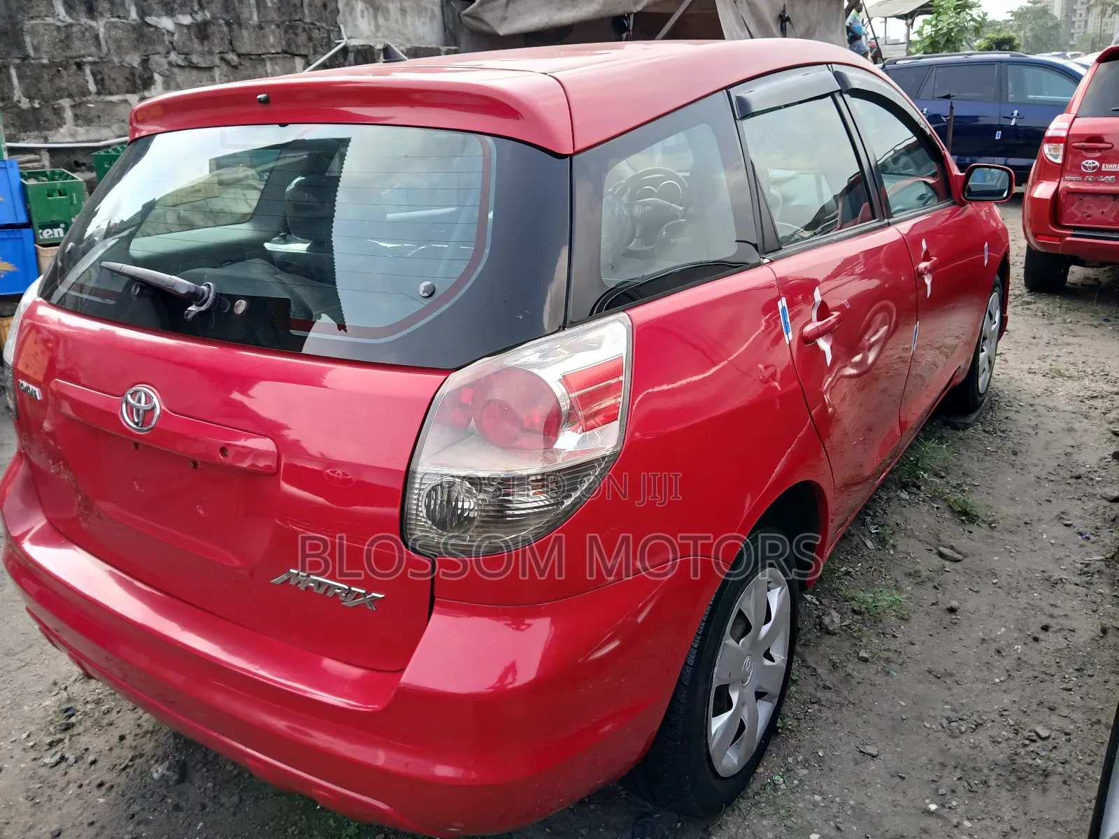 Toyota Matrix Hatchback AWD (1.8L 4cyl 4A) 2006 Red
