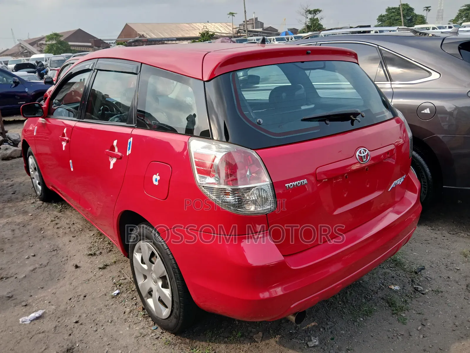 Toyota Matrix Hatchback AWD (1.8L 4cyl 4A) 2006 Red