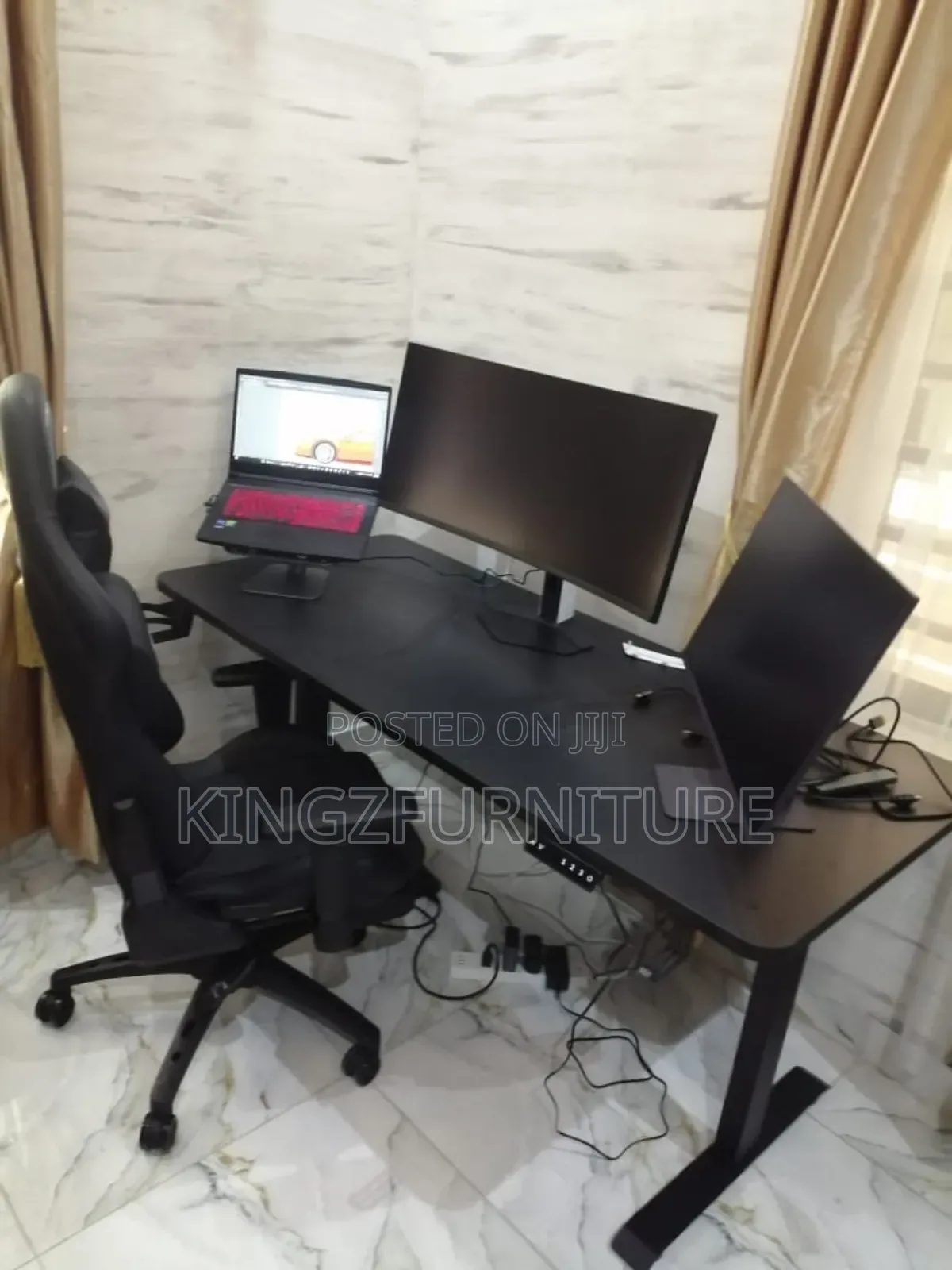 An Electric Height Adjustable Desk 1.6meter With Game Chair