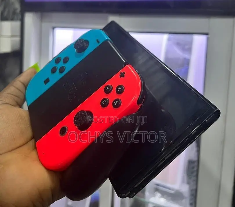 Used Nintendo Switch Oled With Fc24