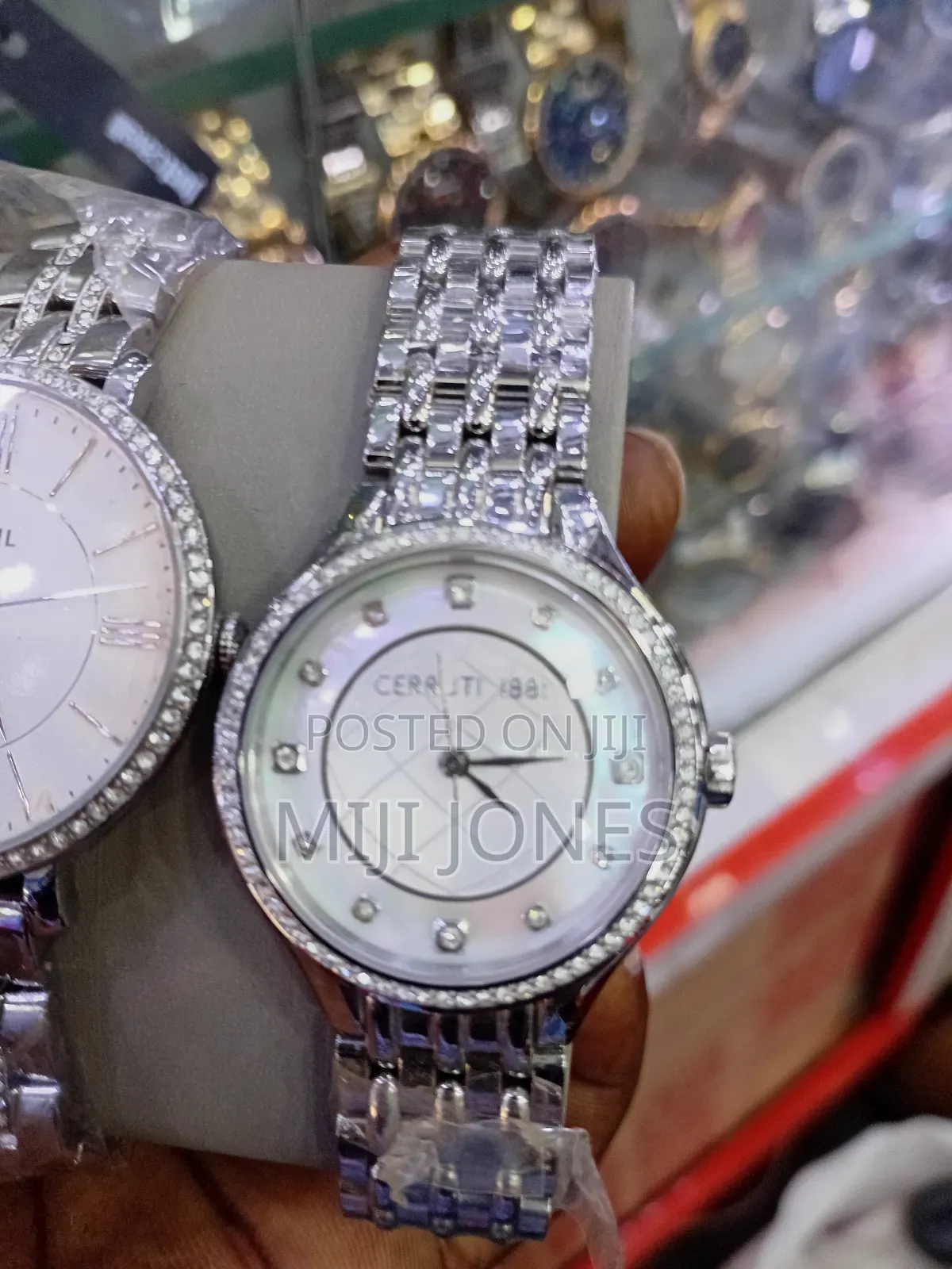 "His & Hers Elegance: Fossil & Cerruti 1881 Silver Watches"