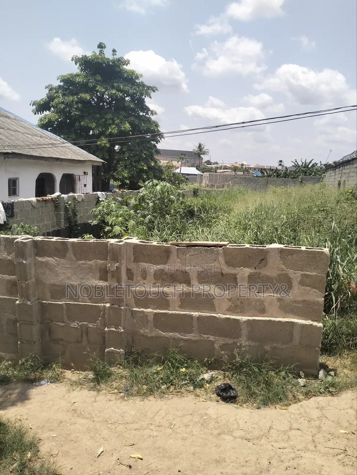 140by 40ft Land at Off Lanre Bus Stop Igando New Town