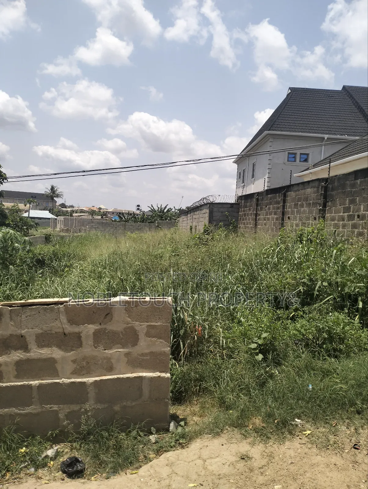 140by 40ft Land at Off Lanre Bus Stop Igando New Town