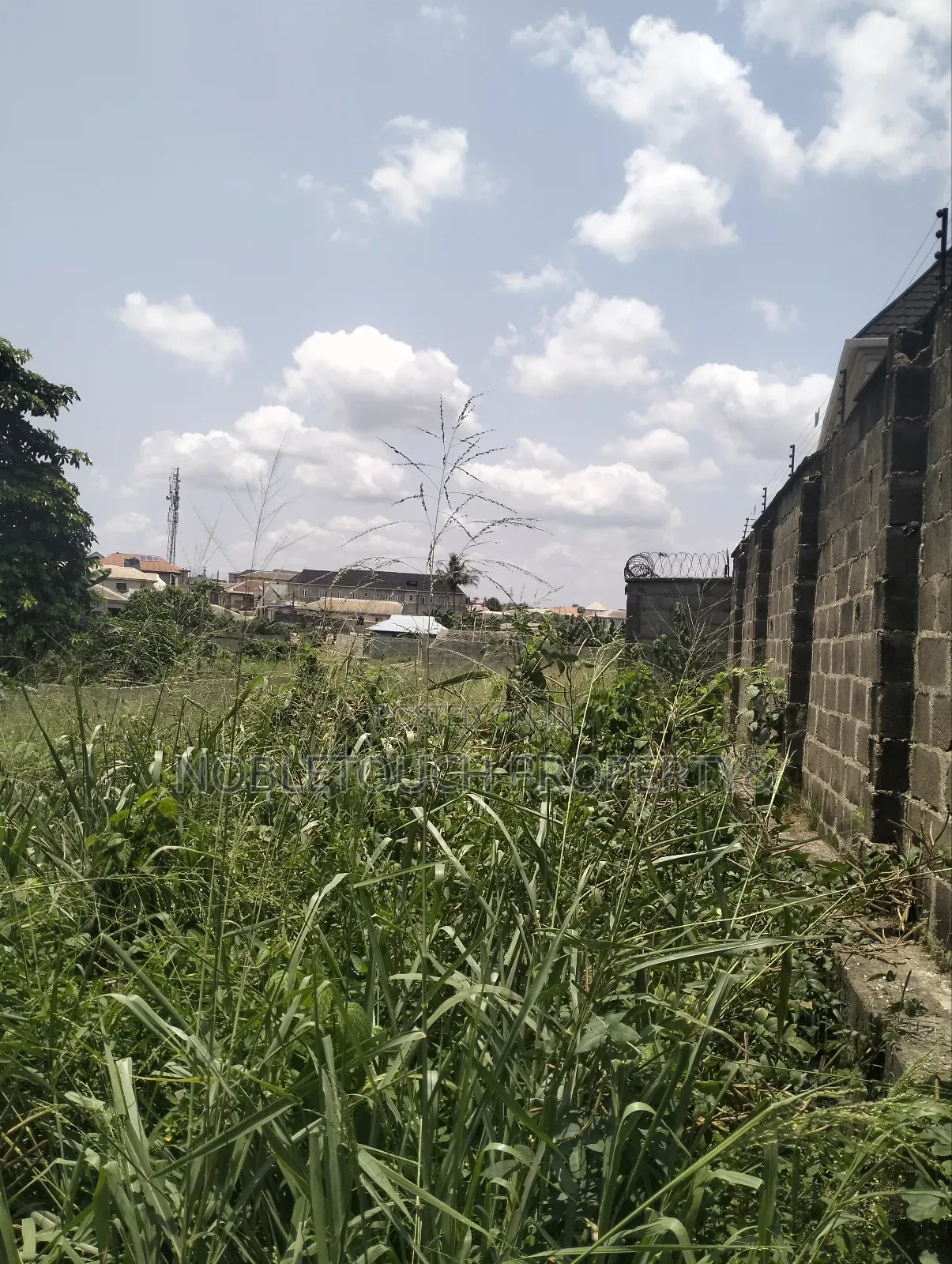 140by 40ft Land at Off Lanre Bus Stop Igando New Town