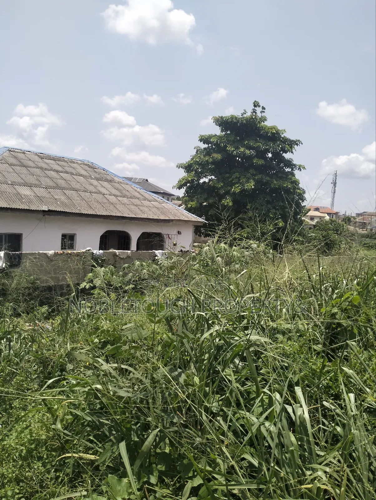 140by 40ft Land at Off Lanre Bus Stop Igando New Town