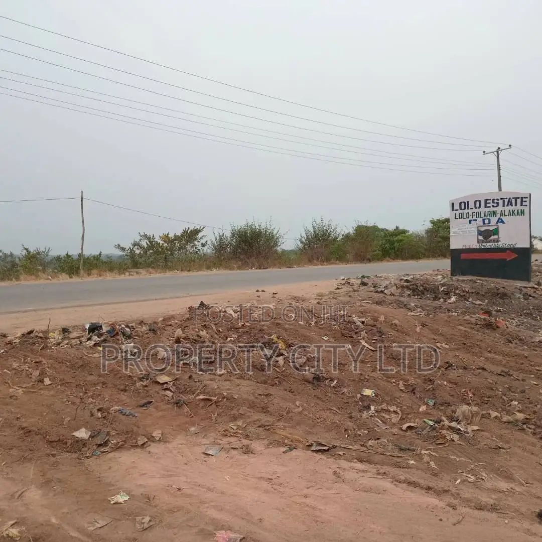 A Fenced and Gated Full Plot Land
