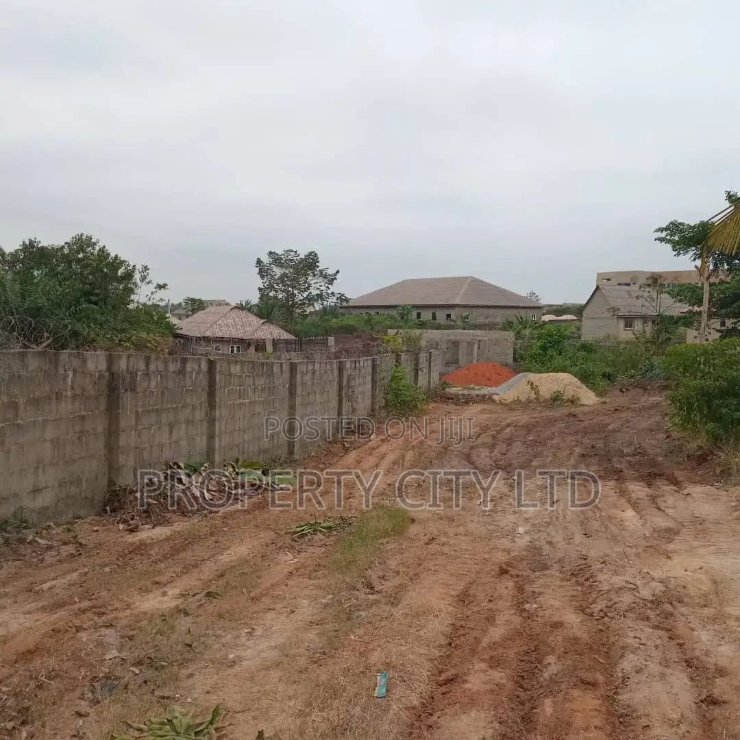 A Fenced and Gated Full Plot Land
