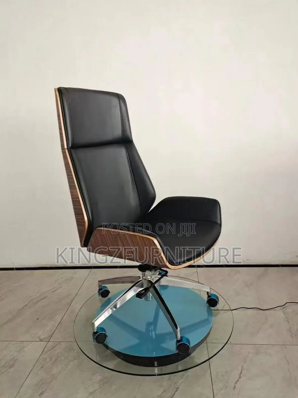 A High-Back Executive Office Chair Featuring Black Leather