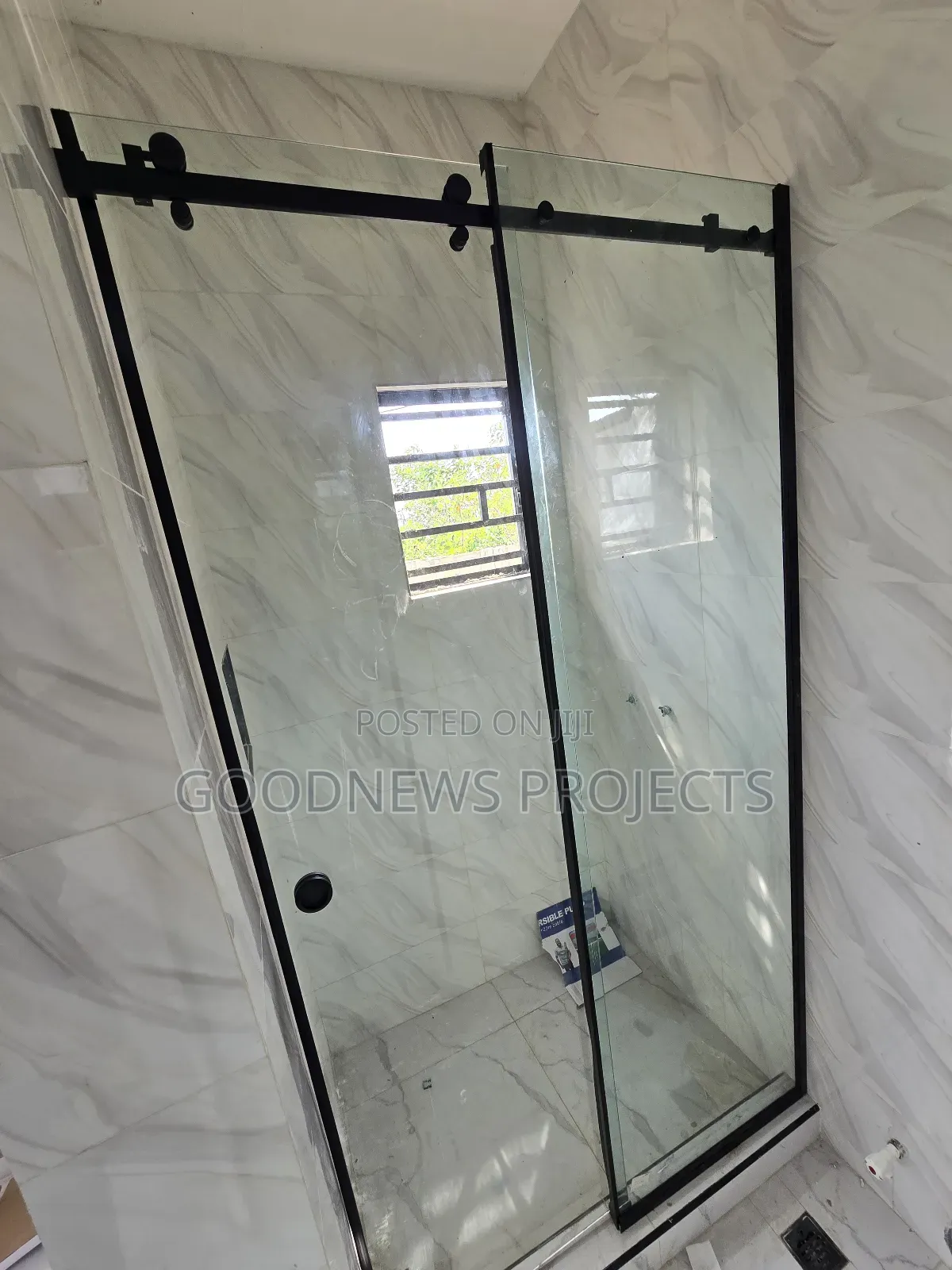 Sliding Shower Door With Black Accessory
