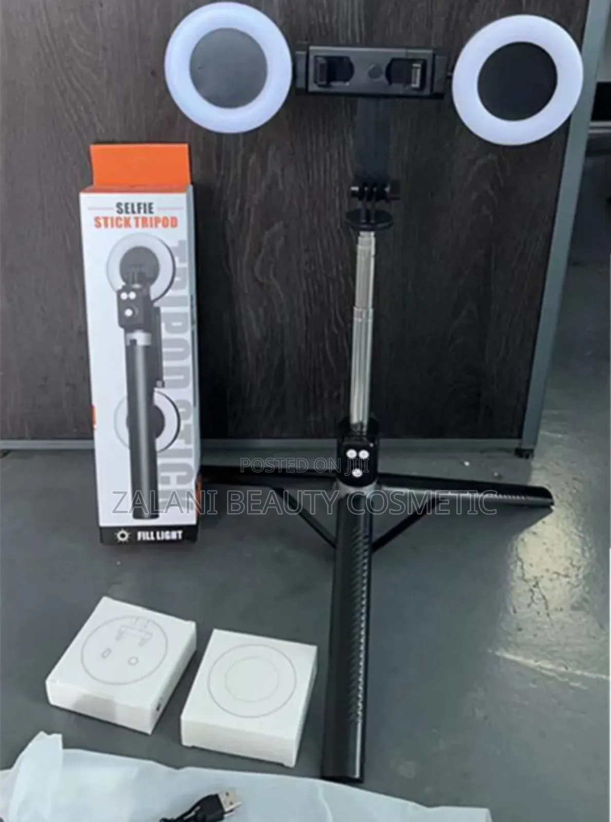 The Packaging for a 3-in-1 Selfie Stick Tripod With Fill Light,