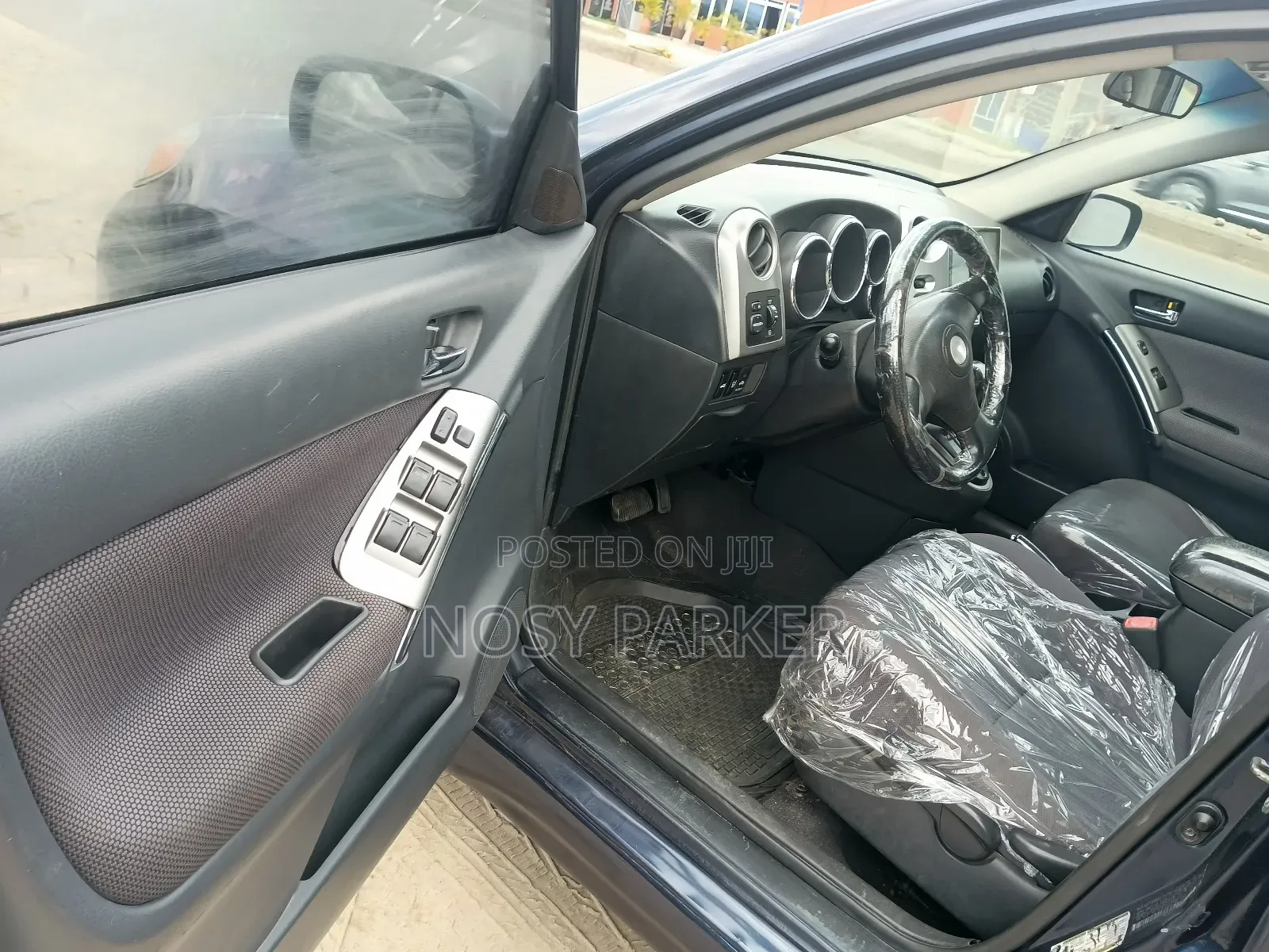 Toyota Matrix Hatchback AWD (1.8L 4cyl 4A) 2006 Blue